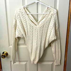 White knit sweater with knot back